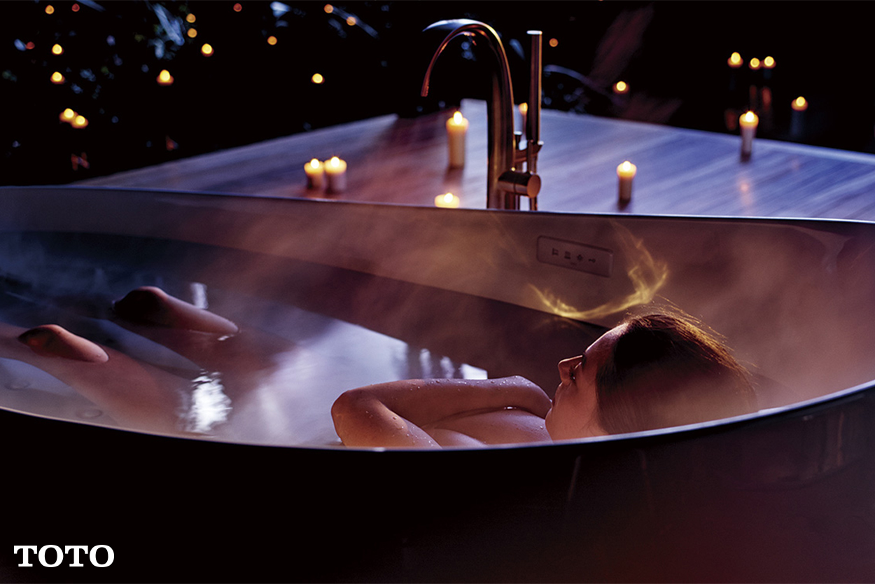 A woman relaxing in a bathtub